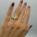 Será que nossas alianças vão combinar com meu anel de noivado?